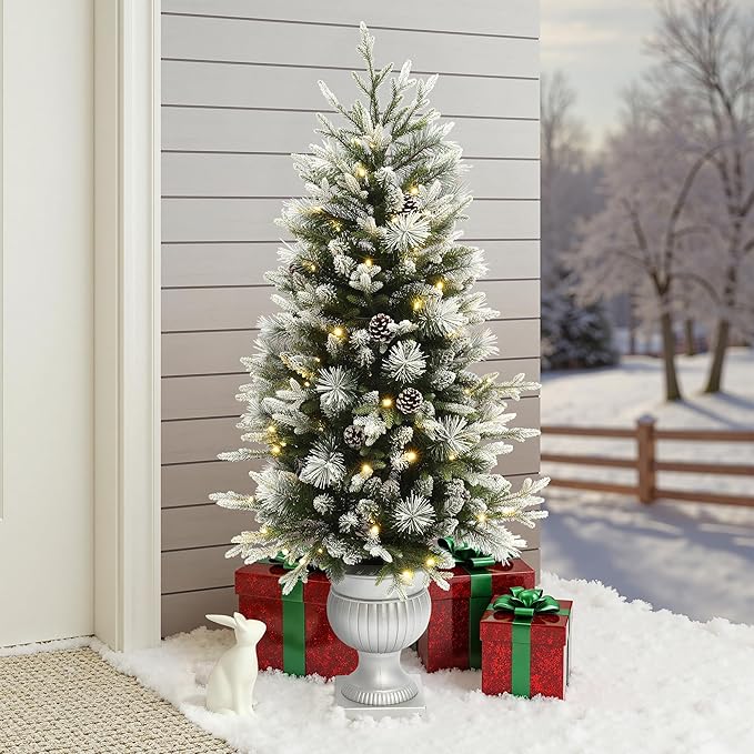 LuxenHome 4.5FT Potted Christmas Tree, Small Flocked Christmas Tree Prelit with 100 LED Lights and Pinecones, Lighted Pencil Artificial Christmas Trees with Urn Style Planter Pot for Indoor, Outdoor