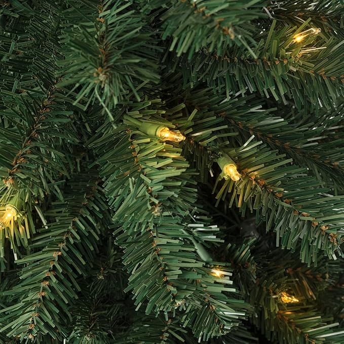 Vienna 4.5ft Prelit Slim Artificial Christmas Tree with 444 Branch Tips, 150 Warm Lights and Metal Stand, 25" Wide Realistic Skinny Pencil Christmas Tree with Lights by Naomi Home