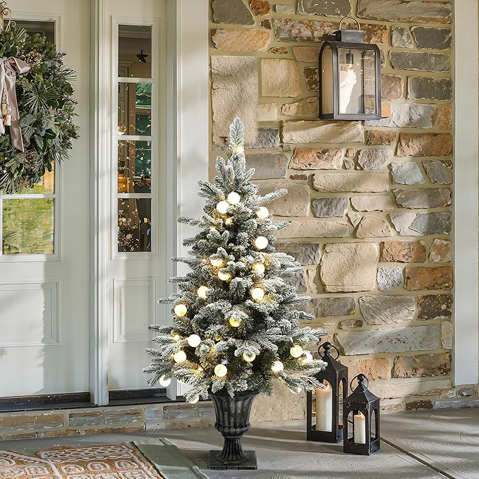 LuxenHome 4FT Small Potted Christmas Tree, Flocked Christmas Tree with 70 LED Globe Lights, Prelit Artificial Xmas Trees with Rustic Urn Pot, Lighted Pine Tree for Indoor, Outdoor Holiday Display