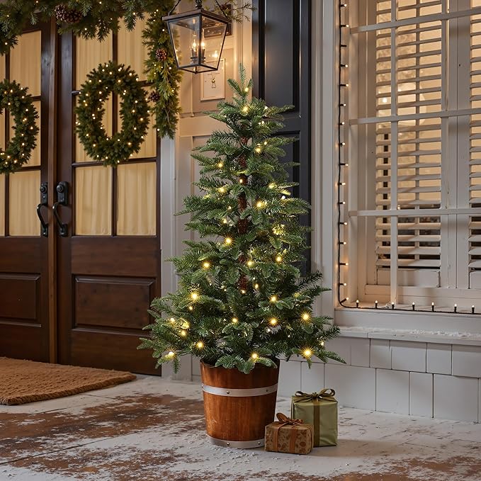 LuxenHome 4FT Small Christmas Tree, Prelit Slim Potted Christmas Trees with 100 Warm White LED Lights, Realistic Fir Tree with Rustic Wood Barrel Planter for Entrance, Hallway Holiday Decorations